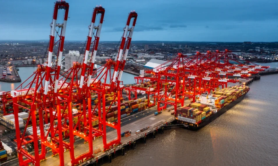Wide shot of the Port of Liverpool, showing the loading bay and a docked ship